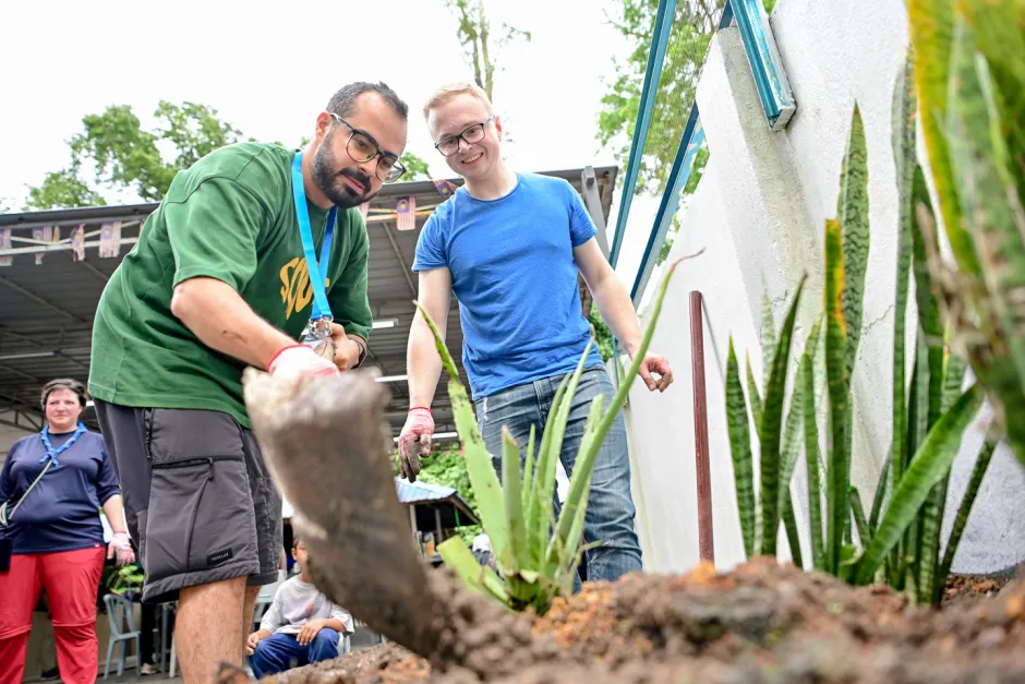 An outdoor Scout digging activity